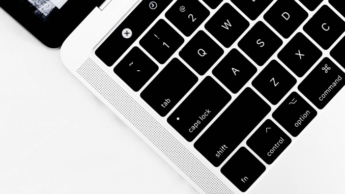 closeup photo of white and black laptop computer